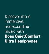 White QuietComfort Ultra Earbuds with green background and glow