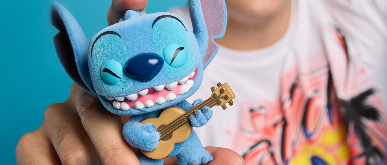 A Disney Stitch playing a Ukelele Funko Pop Figure