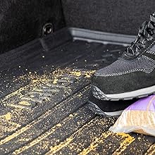 DRIVEDEN Boot Mat showing it's flexibility for ease of access to the spare wheel