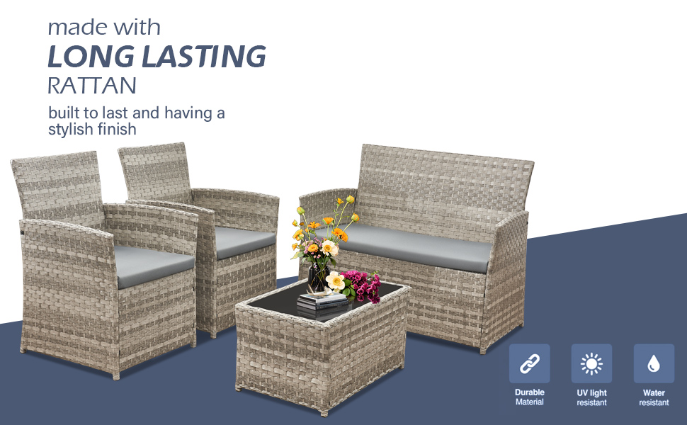 Outdoor patio furniture set including loveseat, chairs, and coffee table with tempered glass top in grey woven wicker material.
