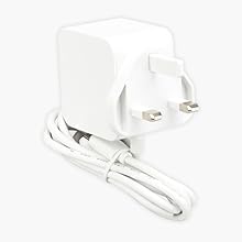 White rectangular electronic device shown from multiple angles, featuring multiple USB and network ports. Product appears to be a networking or connectivity hub device.