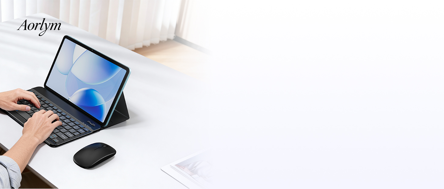 Text reads 'Aothyu'. Laptop with touchscreen display being used on white desk surface with wireless mouse.