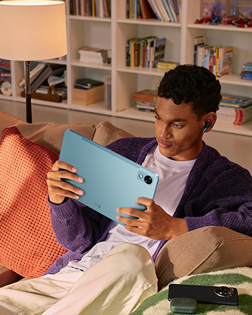 Multiple views of someone using a light blue device at a restaurant table with food and drinks present.