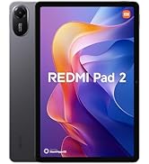 Text reads 'REDMI Pad 2'. Tablet device in light blue color with dual camera system on rear, showing colorful abstract display wallpaper.