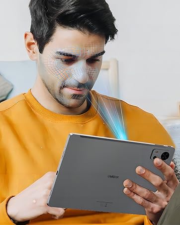 Text reads 'Image 2'. Person in red sweater holding tablet device against background of blurred holiday decorations and lights.